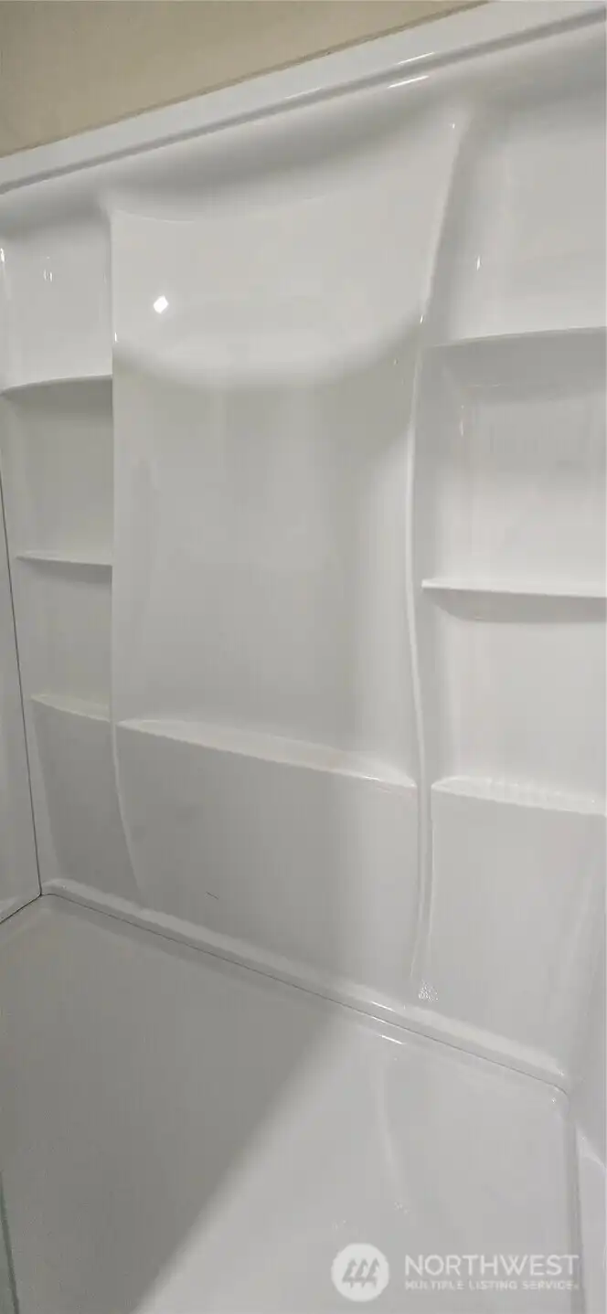 Main Home: Shower with Plenty of Niches for Your Bath Essentials