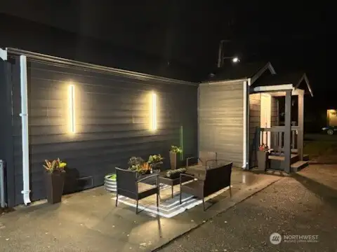 ideyard at night.  Enjoy relaxing evenings in this cozy outdoor space, perfect for unwinding under the stars.