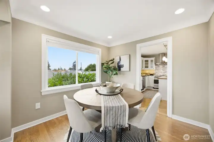 Nice sized dining room also enjoys some views from large north facing window.