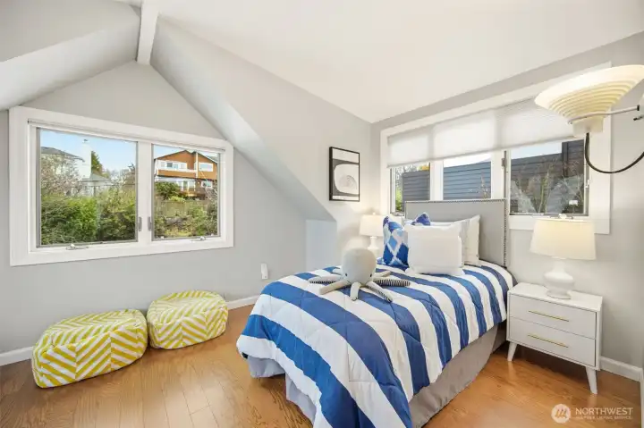 2nd bedroom on upper is on the eastside.  This is only one side of the room...note how big this bedroom is on the floor plans!  There are some water and city skyline views from the north facing window.