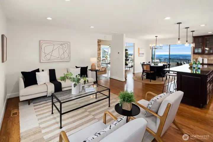 Great room concept kitchen and adjacent gathering space.