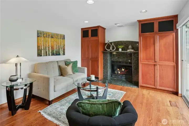 The cozy family room also overlooks the trees, and it will be a lovely place to relax.