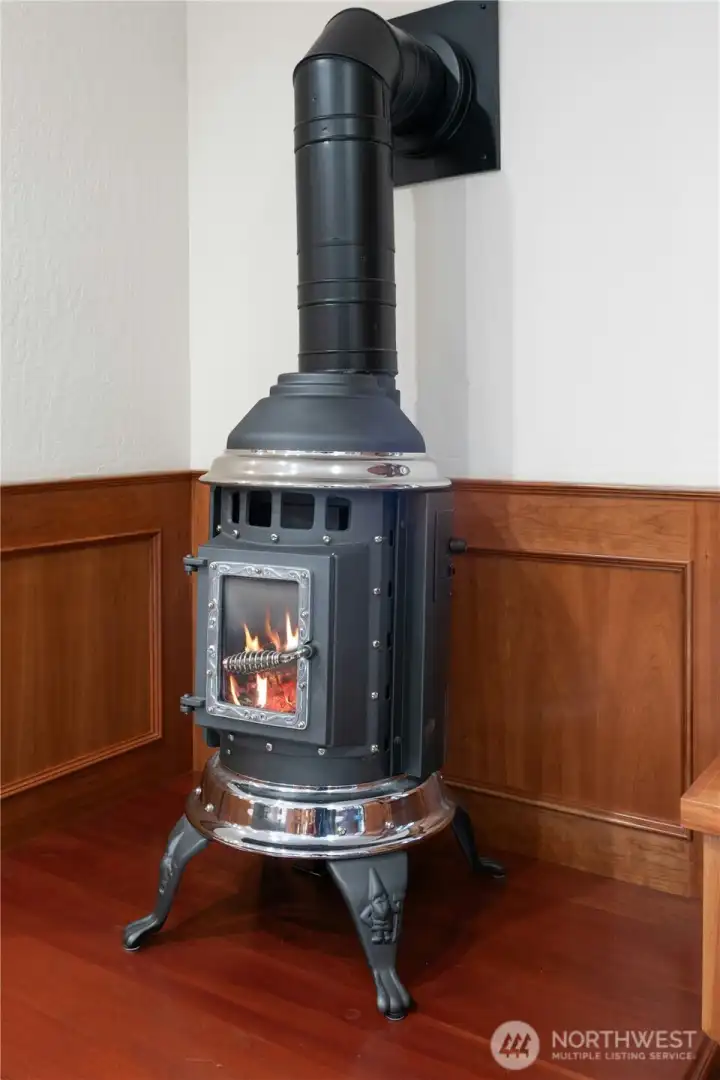 Warm your office with this gas fireplace, easily operated with a thermostat on the wall.