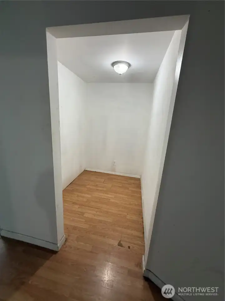 Storage area in downstairs hallway