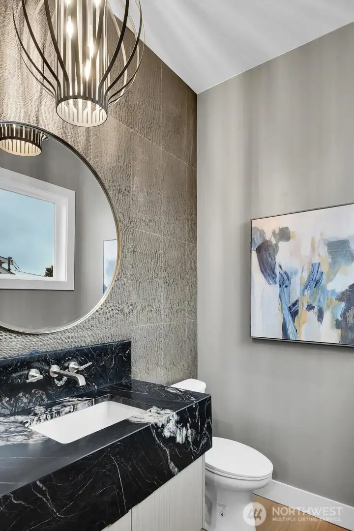 Lovely main floor powder room with designer touches