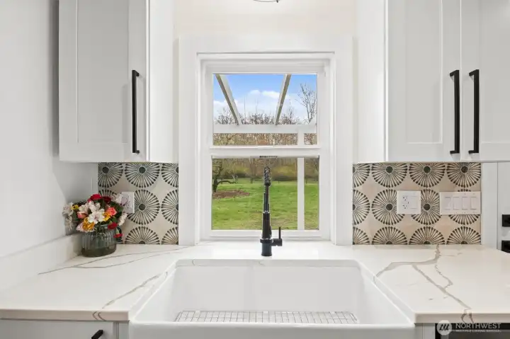 Beautiful tile work and looking out upon your own peach tree!