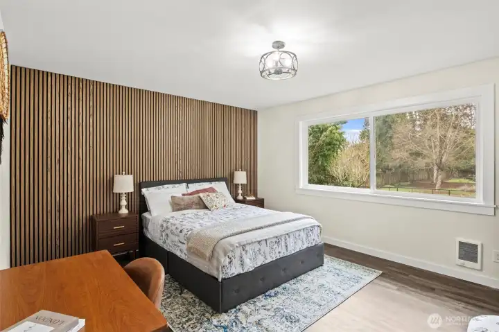 An abundance of space in this primary bedroom with a large walk-in closet, too.