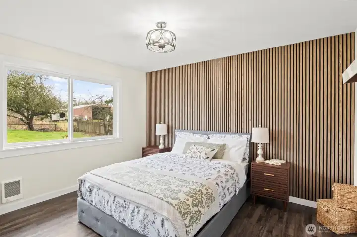 2nd bedroom is also quite large. Queen size bed and nightstands for size reference.