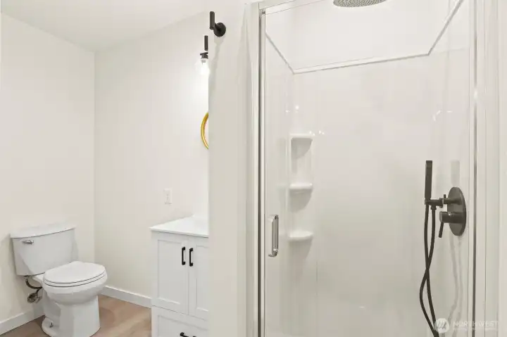 Inside additional living space bathroom and shower.