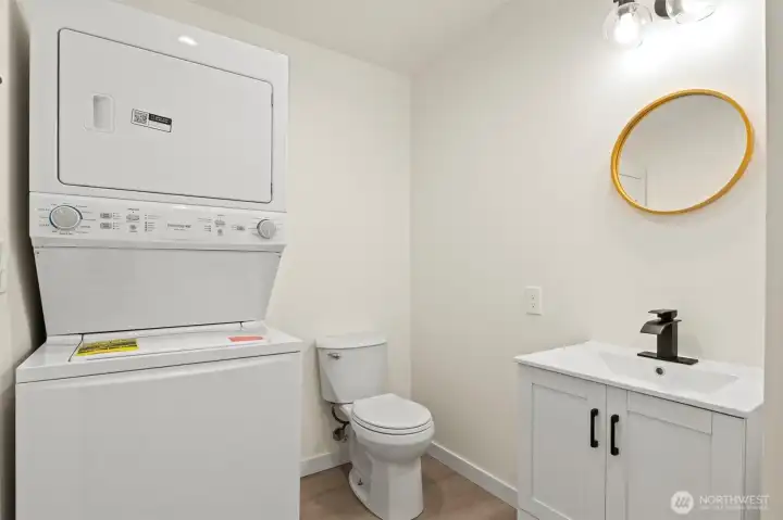 Brand new w/d for additional living space. Tucked away in the bathroom for your convenience.