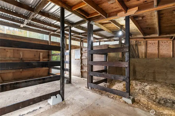 Two-stall barn also leads into hoop barn.