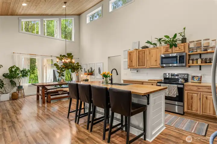 Thoughtfully curated lighting and organic textures add warmth and character, blending contemporary comfort with the tranquility of the natural surroundings.
