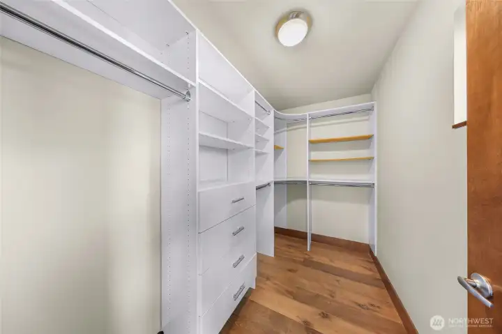 Walk-in closet for primary Walk-in closet for primary