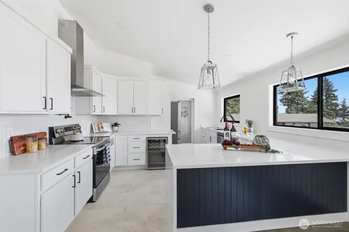 Full kitchen featuring a wine refrigerator, perfect for entertaining.