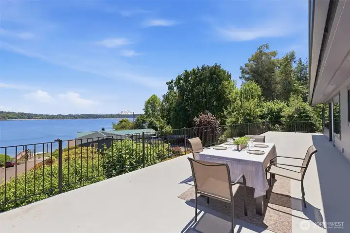 Expansive deck overlooking Budd Inlet with gorgeous views of Mt. Rainier.
