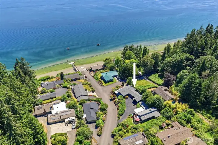 Aerial view showing the property's prime location in close proximity to the water.