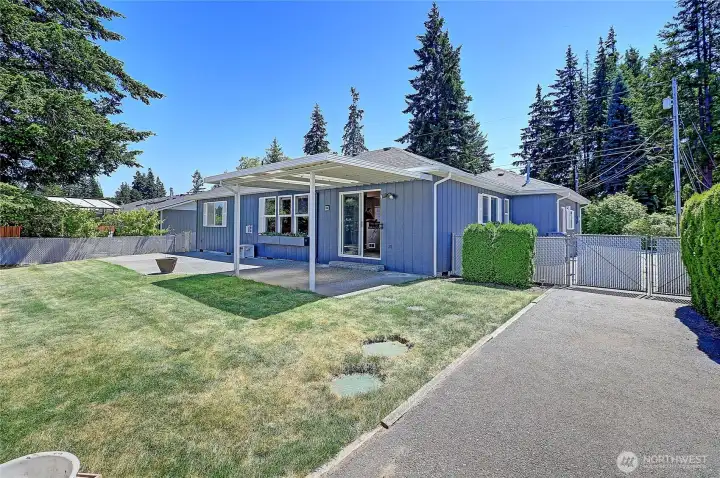 The backyard is an entertainers dream, plenty of room for yard games, lounging around or relaxing under your covered patio.