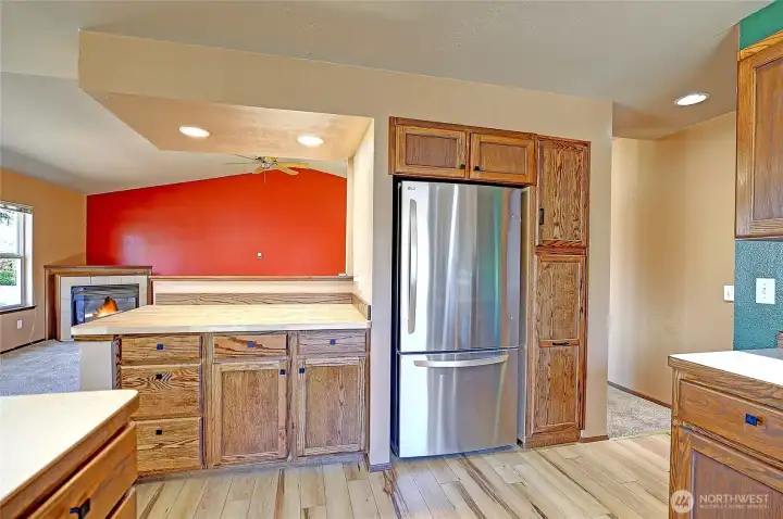 Plenty of room to entertain guests in the kitchen looking into the living room.