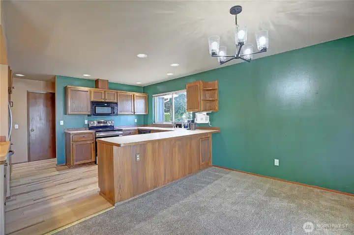 Enjoy cooking meals in this open kitchen just off the dining area.