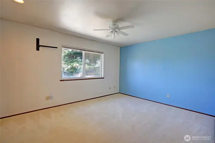 The large primary bedroom with ensuite.