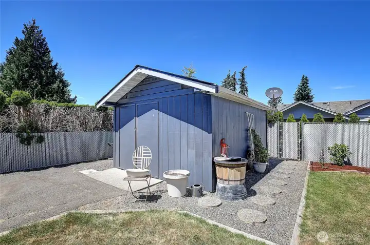 Large and spacious shed for your golf cart or storing all your outdoor lawn tools.