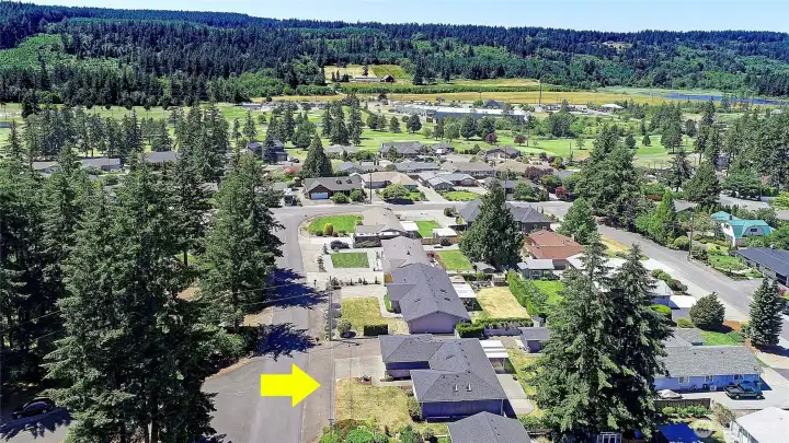 Aerial view facing West is about a minute drive to the golf course which is included in your HOA dues.