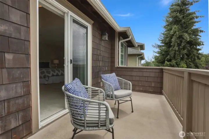 A private west facing deck where evening skies, fresh sea air, and the natural beauty of Puget Sound set the perfect backdrop for relaxation.