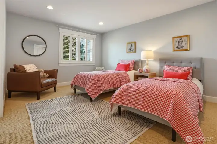 Completing the top floor is a spacious third bedroom, providing generous room, comfort, and versatility for a variety of uses.