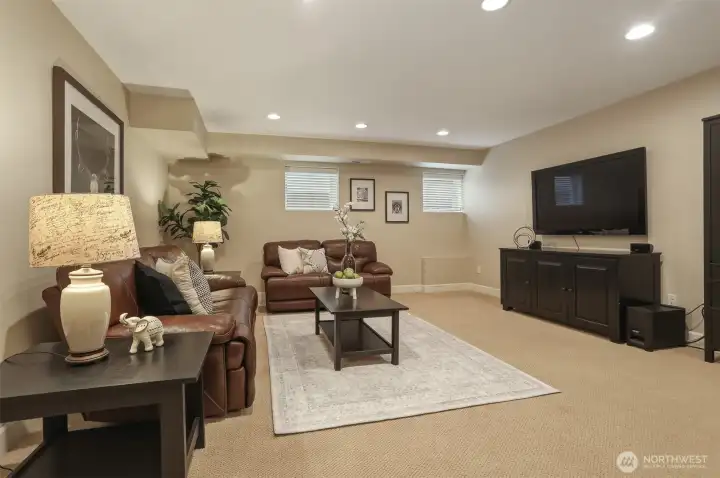This inviting space offers the perfect setting for memorable movie nights and cozy gatherings.