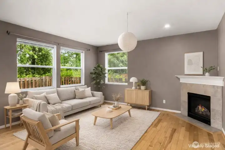 Cozy family room centered around the fireplace. Cozy family room centered around the fireplace.