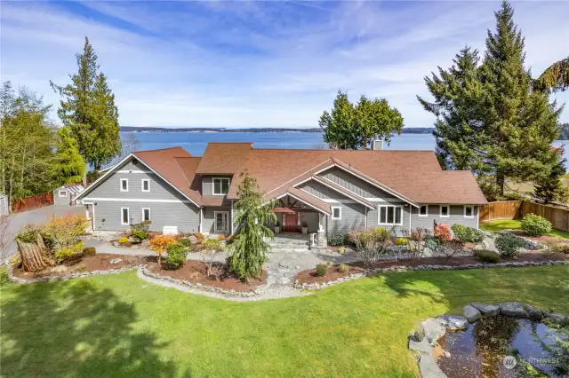 15 White Rock Lane, Port Ludlow faces East and has incredible sunrises and views of the water and marine traffic.