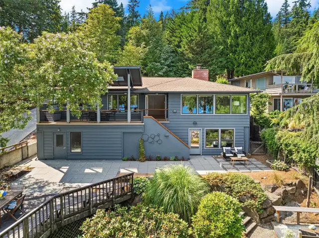 Quintessential mid-century modern one-story with daylight basement and loads of smart upgrades.