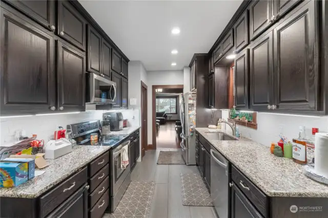 Lots of storage in the galley kitchen, tile flooring and LED undermount lights.