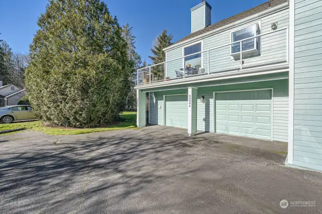 The spacious 1-car garage has a remote opener with a back door which is just steps to the unit's front door.