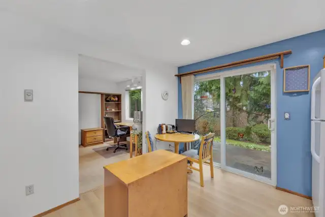 The kitchen has a sliding door to the exterior.