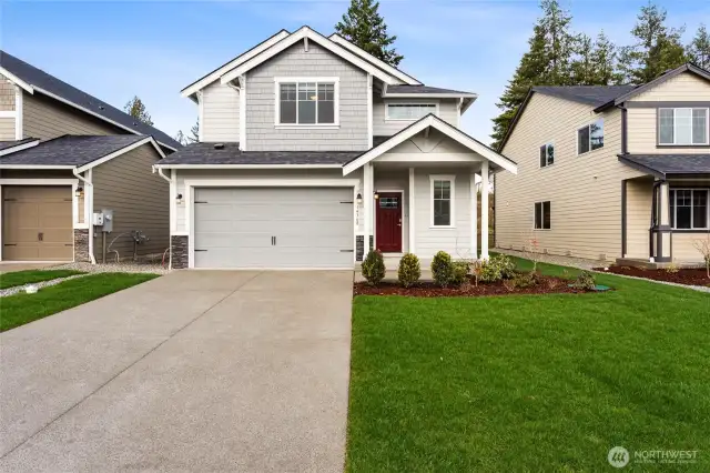 **Photos are of the same home in another community. Features, specs and finishes will vary** This is a presale home.