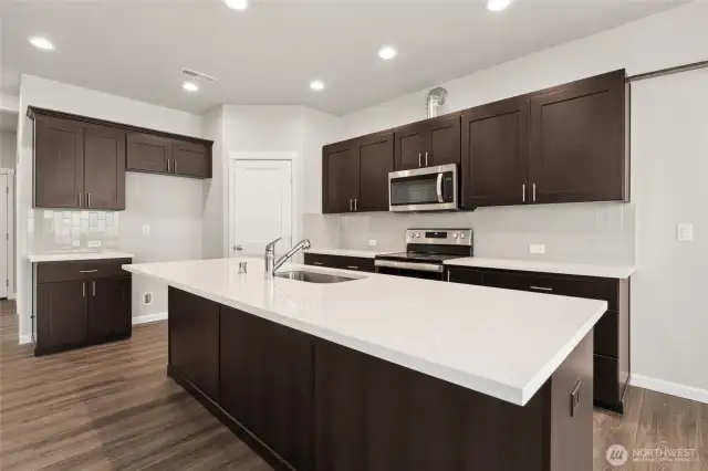 **Photos are of the same home in another community. Features, specs and finishes will vary** This is a presale home.
