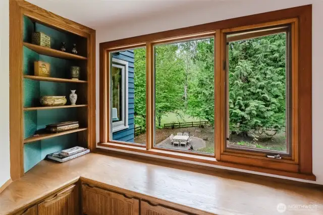 A nook in the primary bedroom window to cozy up with a book.