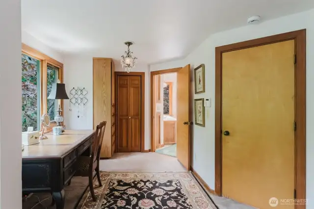 The large primary has a walk in closet and an adjacent large bathroom.
