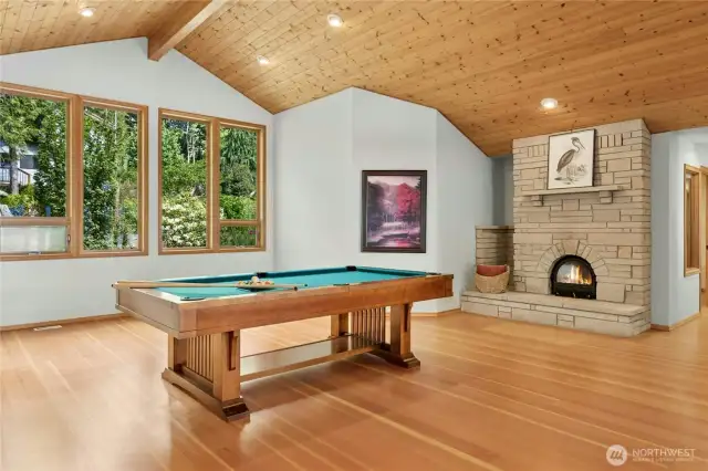 Billiards Room with custom Russian Fireplace and view deck