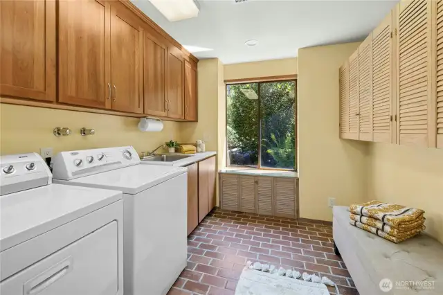 Laundry room with loads of storage