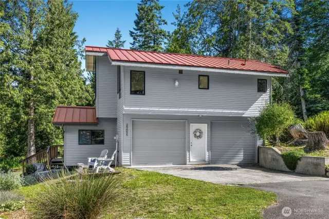 Carriage House is a legal ADU with it's own address (23585 Canyon Rd), septic and utilities. Perfect for income generation.