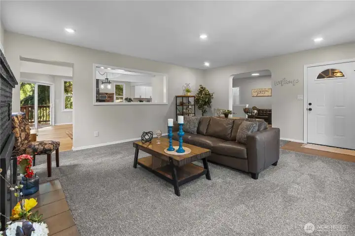 From this view, you can see into the Dining Room, View the Main Entrance and the Den.
