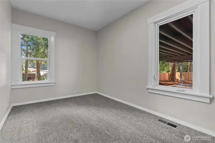 Bedroom #2 Faces the backyard and carport.