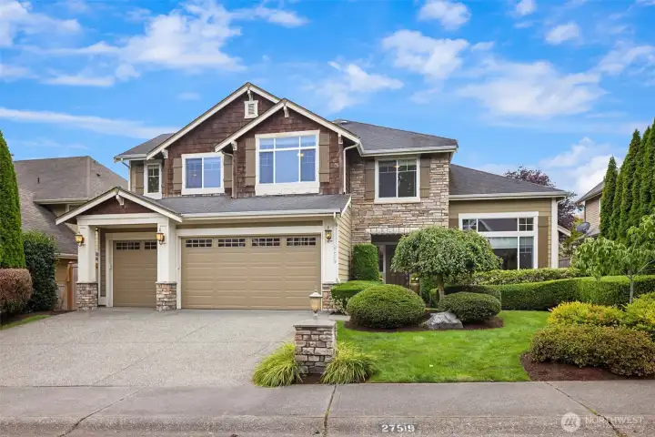 A well appointed home with freshly painted garage doors & front door.  Custom stone work on the front side.  Beautiful landscaped yard with sprinkler systems.  Large driveway w/ 3 car garage