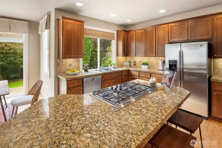 The kitchen has nice views looking out into the backyard & patio area
