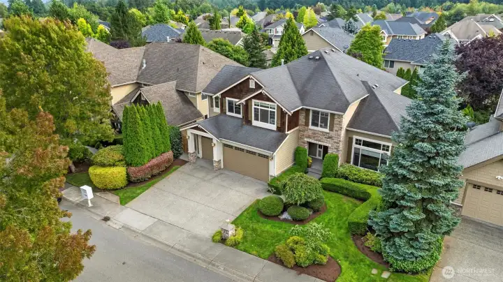 Beautifully landscaped yard space on sprinklers both front and back.