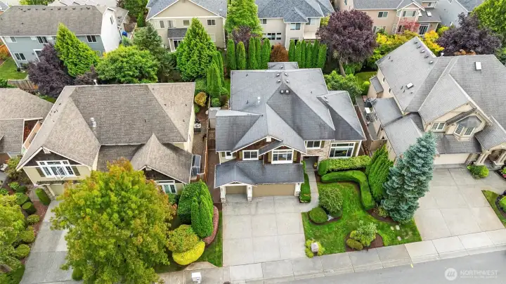 A big 3 car attached garage with plenty of parking space for your family in the front driveway