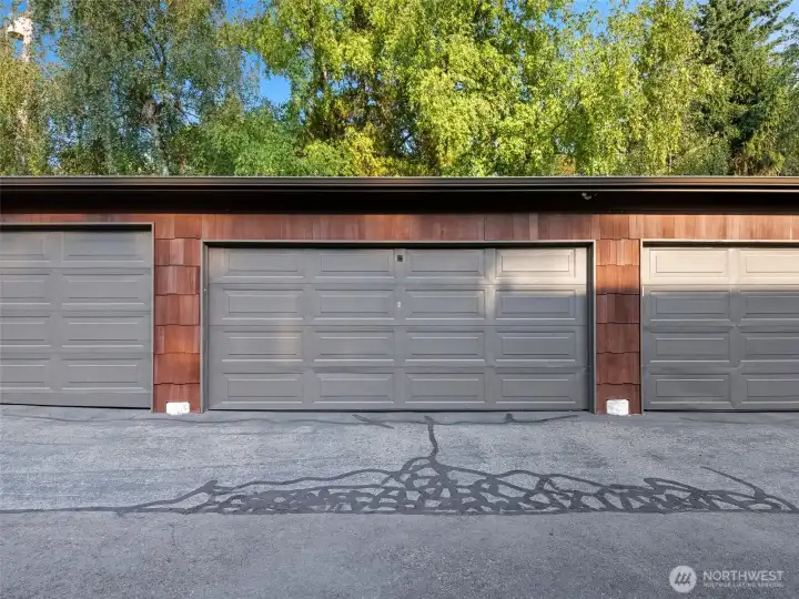 Enclosed garage shared with one other unit.