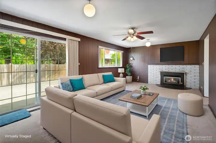 Virtually staged to show possibilities. Second living room / bonus room with sliding glass door leading to patio and fully fenced backyard.